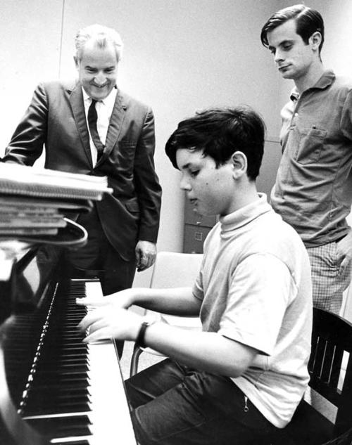 Ward with students Darrell Rosenbluth (at piano) and Bruce Moss (far right)