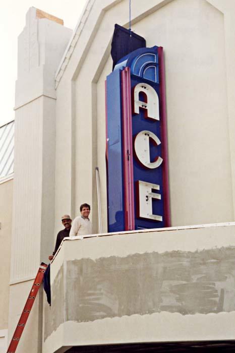 Steven Jones (left), Faculty Member, School of Filmmaking and John Toia (right), Faculty Member, School of Design &amp; Production beside ACE Theatre marquee