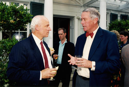 John Davis III (at left) listens to John Gates (right).