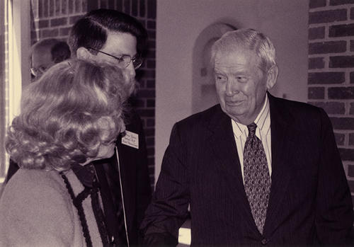 Former Governor of North Carolina Terry Sanford (at right) greets Mary D.B. Semans (at left).