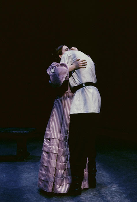 Catherine Dent as Natalya hugs Cade Chilcoat as Aleksei.