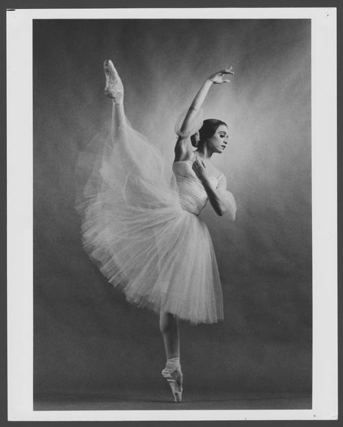 Inscribed on back: (Martha Jane) Janie Parker; Dance alumna; Houston Ballet 2615 Colquitt Houston, Texas 77098; Giselle; Choreographed by Jean Coralli/Jules Perrot; Produced by Peter Wright; Music by Adolphe Adam; Sets and Costumes by Peter Farmer; Pg 18A 20%. Photo used in 1990 School of Dance brochure.